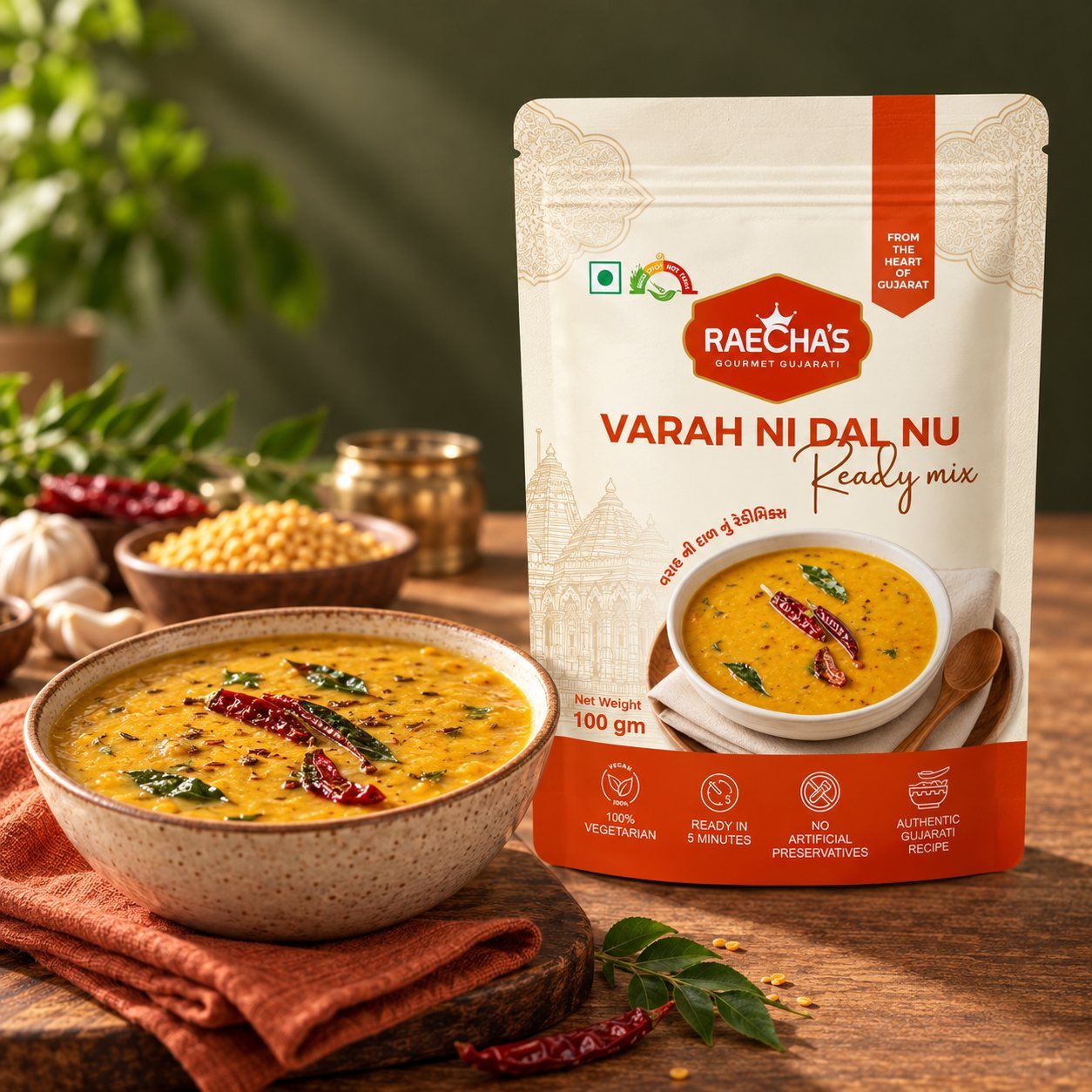 Raecha's Varah ni Dal nu Ready mix pouch beside a bowl of daal with rotli and rice.